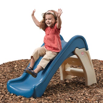 Play & Fold Jr Slide with girl sliding